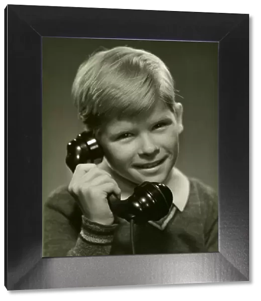 Young boy on telephone