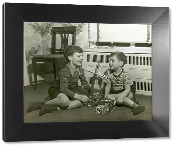 Two little brothers with Erector set
