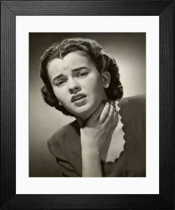 Framed Print : Woman holding sore throat Framed Print : Woman holding sore throat