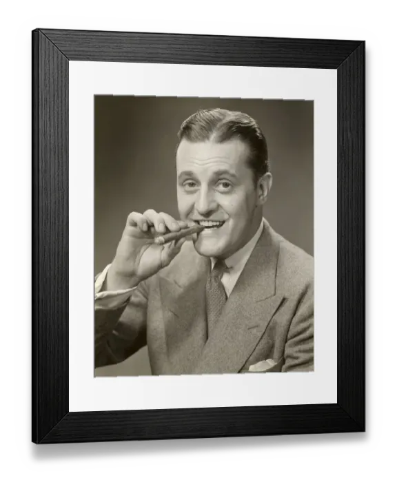 Framed Print : Portrait of man smoking cigar Framed Print : Portrait of man smoking cigar