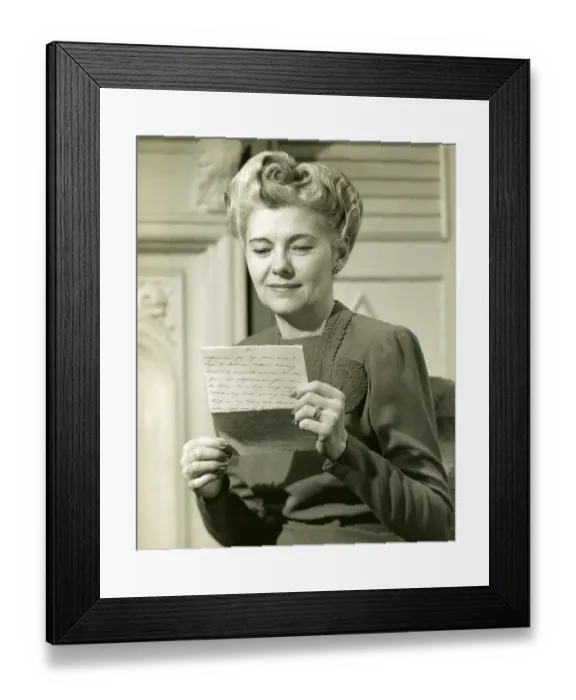 Framed Print : Mature woman reading letter Framed Print : Mature woman reading letter