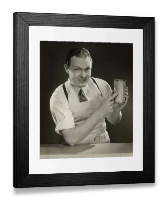 Framed Print : Grocer explaining label on product Framed Print : Grocer explaining label on product