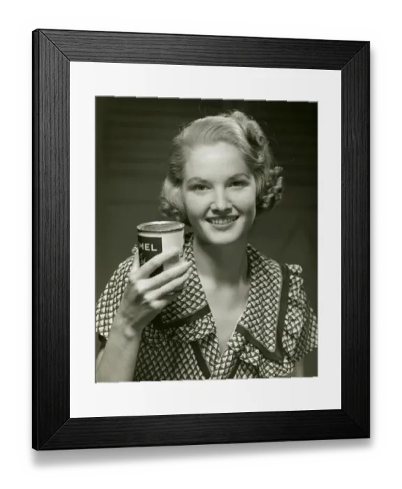 Framed Print : Woman holding can of food Framed Print : Woman holding can of food