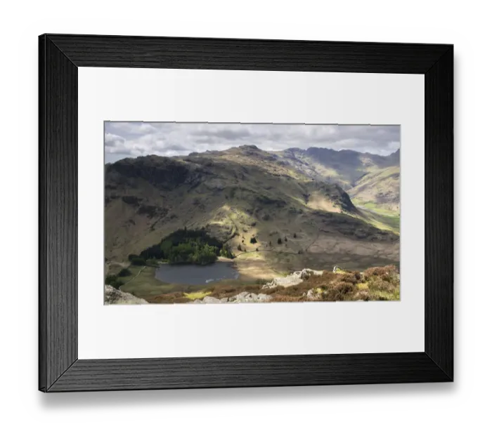 Framed Print : Blea Tarn. Mountain lake surrounded by rocky landscape of open hills Framed Print : Blea Tarn. Mountain lake surrounded by rocky landscape of open hills