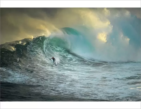 Surfer on a big wave at Jaws