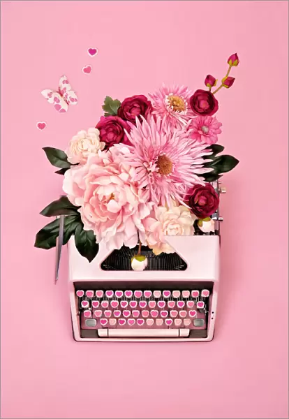 Vintage typewriter with flowers