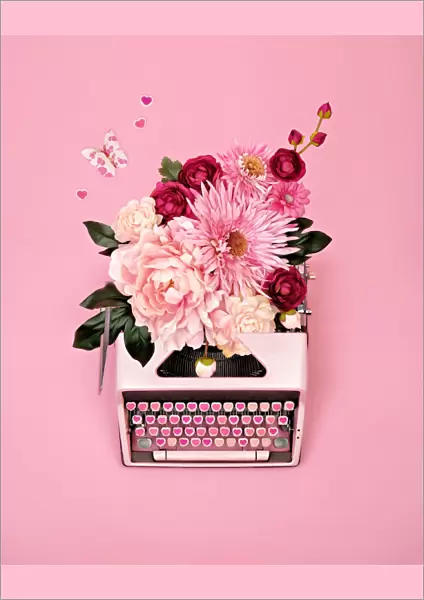 Vintage typewriter with flowers