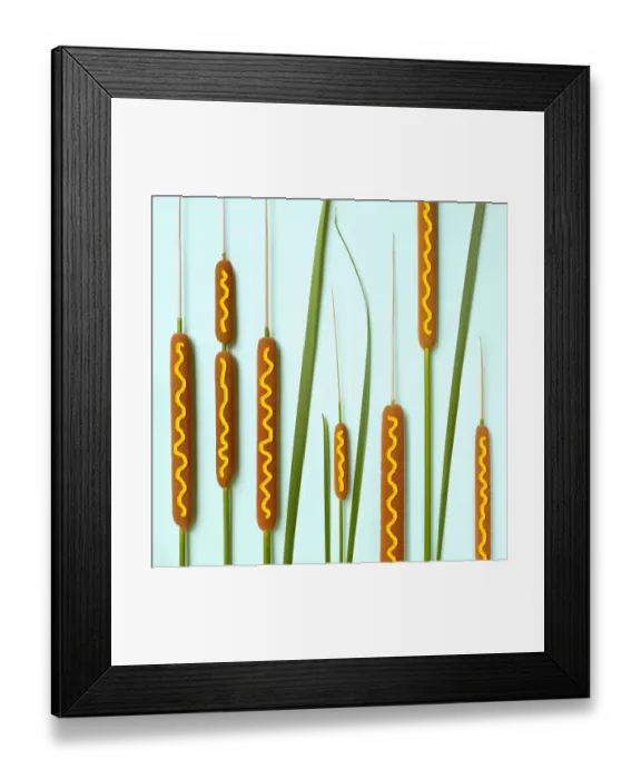Framed Print : Cattails decorated with mustard to look like corn dogs Framed Print : Cattails decorated with mustard to look like corn dogs