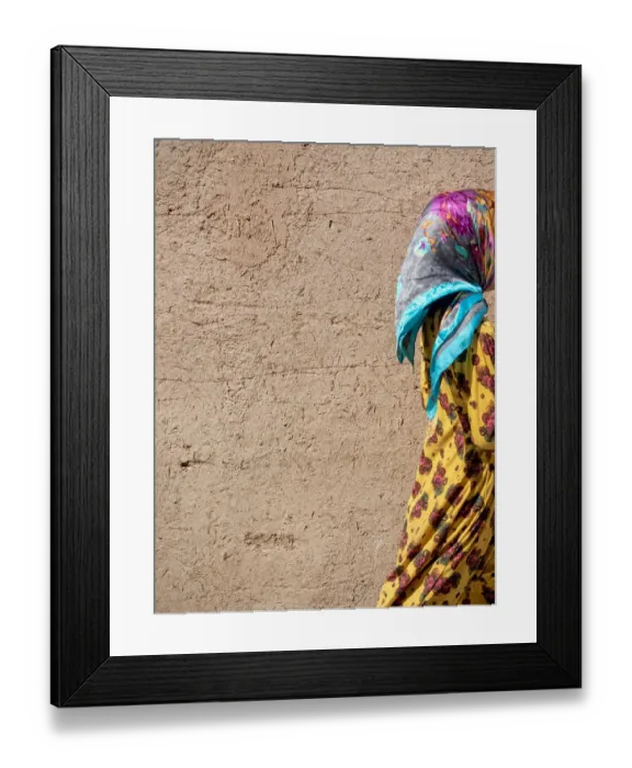 Framed Print : Colorful dressed girl in Yazd adobe old town, Iran Framed Print : Colorful dressed girl in Yazd adobe old town, Iran