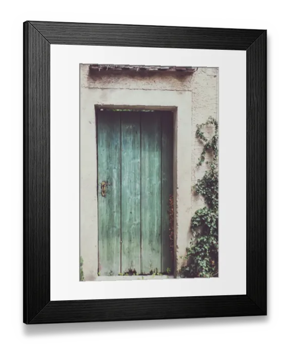 Framed Print : Image of a damaged, old and deteriorating brick wall with half of an old, wooden door on a run down house Framed Print : Image of a damaged, old and deteriorating brick wall with half of an old, wooden door on a run down house