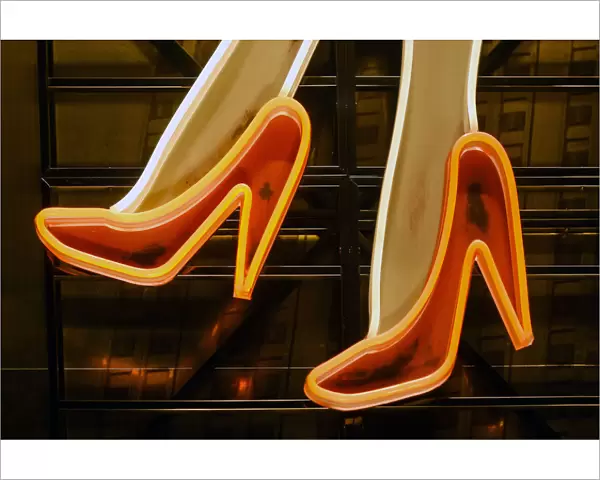 Part of neon light sign, red high heels