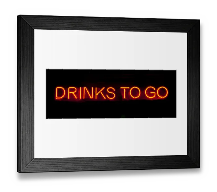 Framed Print : Drinks to go neon sign on a black background Framed Print : Drinks to go neon sign on a black background