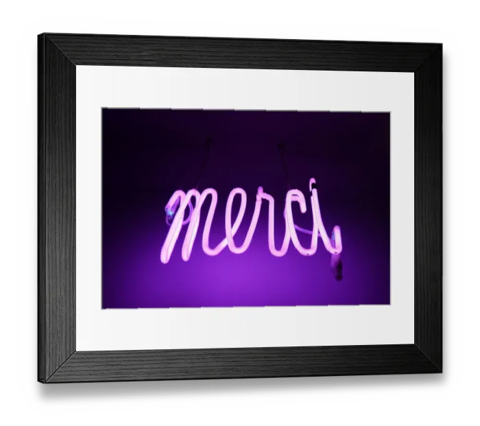 Framed Print : Merci. Pink and purple Neon light sign saying merci (thanks in french) Framed Print : Merci. Pink and purple Neon light sign saying merci (thanks in french)