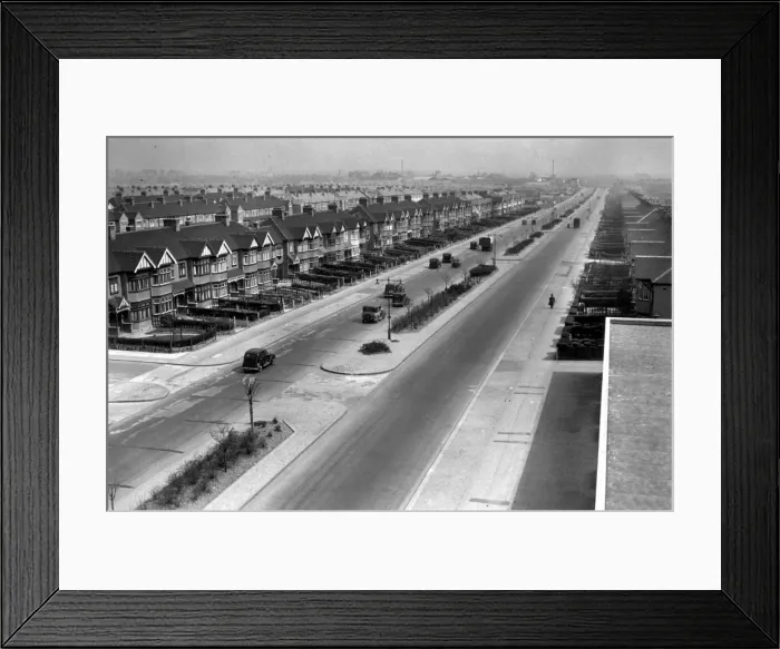 Framed Print : Suburbia. April 1936: A typical 1930s suburban street in Ilford, London Framed Print : Suburbia. April 1936: A typical 1930s suburban street in Ilford, London