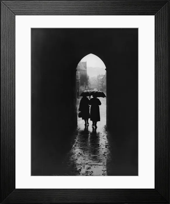Framed Print : Rainy Day. December 1934: Two women, holding raised umbrellas Framed Print : Rainy Day. December 1934: Two women, holding raised umbrellas