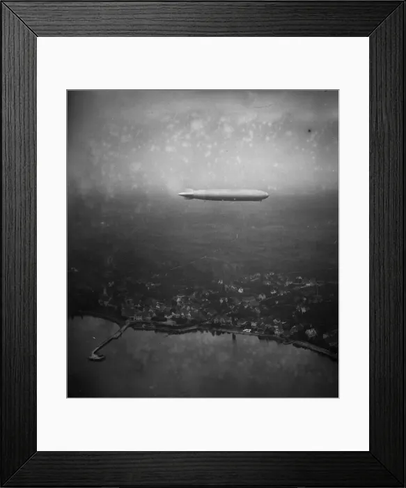 Framed Print : Zeppelin In Flight