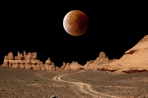 Blood moon over Libyan desert