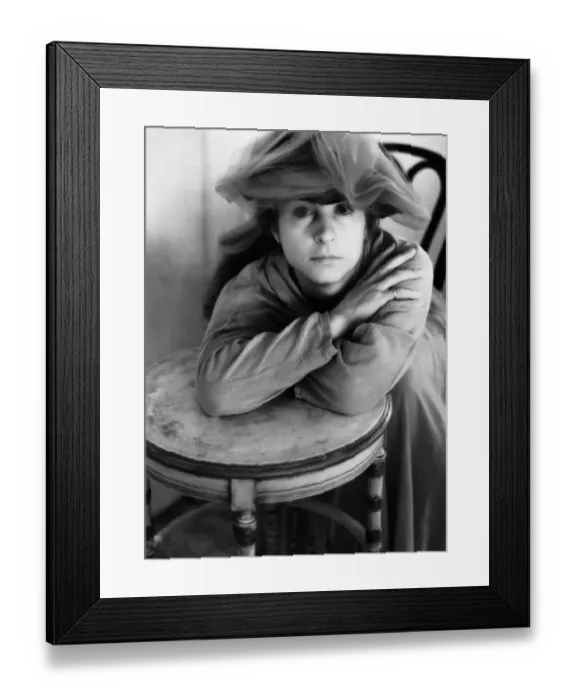Framed Print : Woman Leaning on Table Framed Print : Woman Leaning on Table