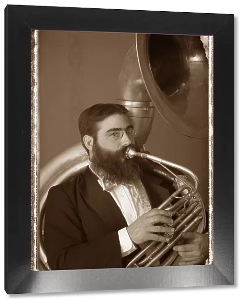 Old Fashioned Portrait of a Male Tuba Player