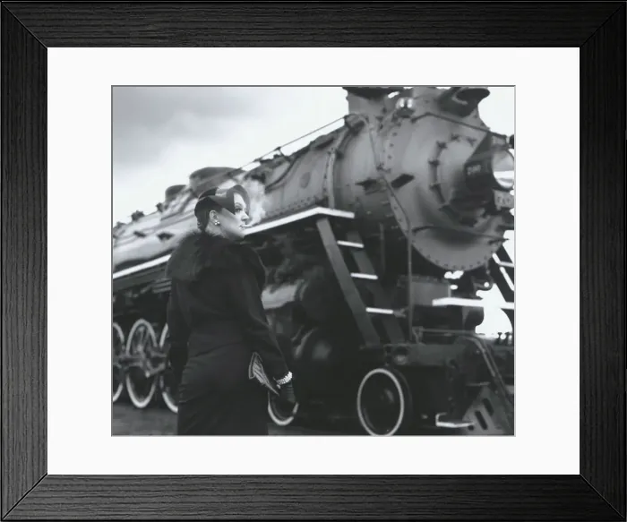 Framed Print : Woman Smoking by Steam Engine Framed Print : Woman Smoking by Steam Engine