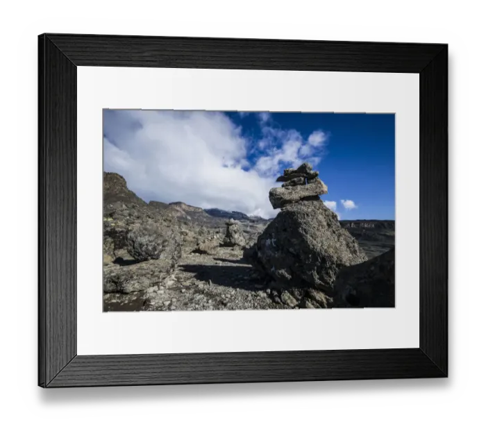 Framed Print : Cairns lead the way through harsh alpine zone landscape around Moir Huts campsite, Mount Kilimanjaro, Kilimanjaro Region, Tanzania Framed Print : Cairns lead the way through harsh alpine zone landscape around Moir Huts campsite, Mount Kilimanjaro, Kilimanjaro Region, Tanzania