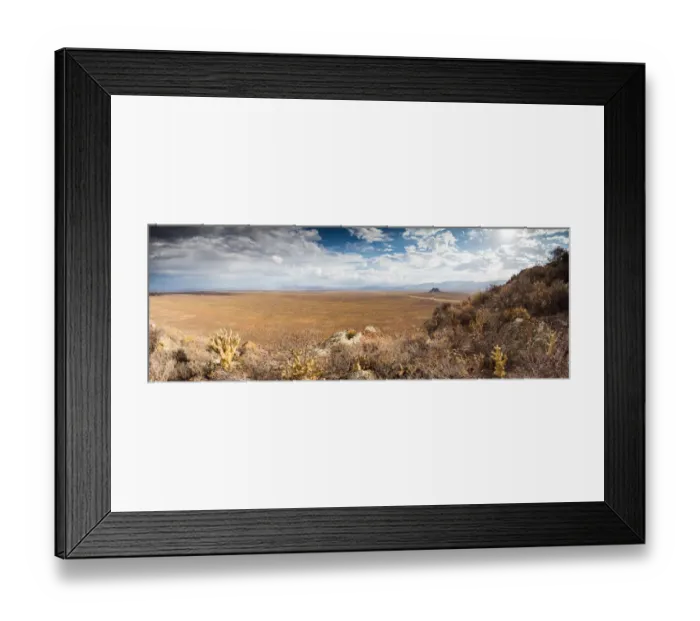 Framed Print : Panoramic views over the Tankwa Karoo Desert with dramatic thunderclouds in the sky Framed Print : Panoramic views over the Tankwa Karoo Desert with dramatic thunderclouds in the sky