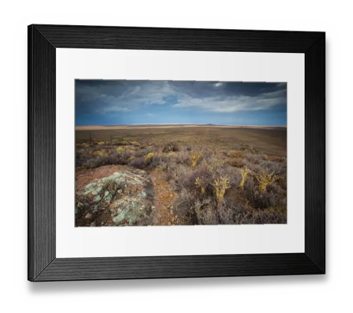 Framed Print : Panoramic views over the Tankwa Karoo Desert with dramatic thunderclouds in the sky Framed Print : Panoramic views over the Tankwa Karoo Desert with dramatic thunderclouds in the sky