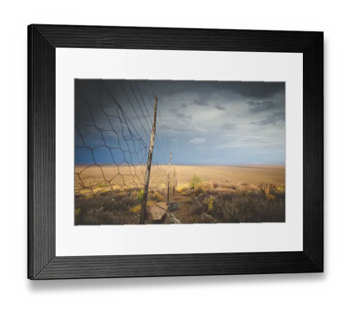 Framed Print : Panoramic views over the Tankwa Karoo Desert with dramatic thunderclouds in the sky
