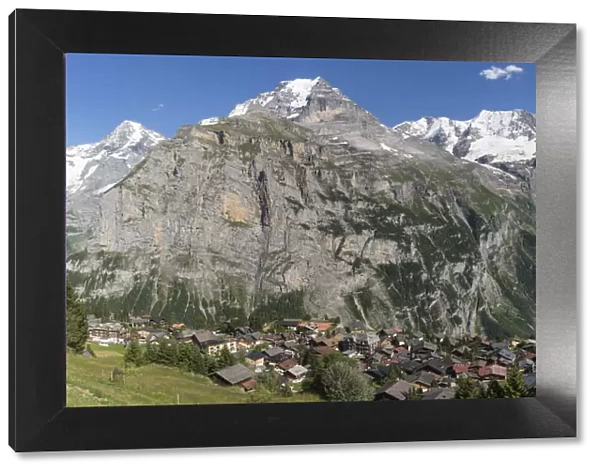 Murren village above Lauterbrunnen Valley with Monch mountain in background, Swiss Alps, Switzerland