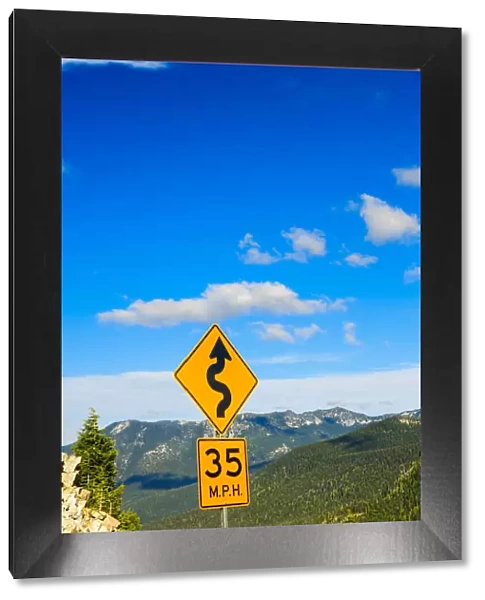 Winding road sign on Chinook Pass, just outside of Mt. Rainer National Park, Washington State, USA