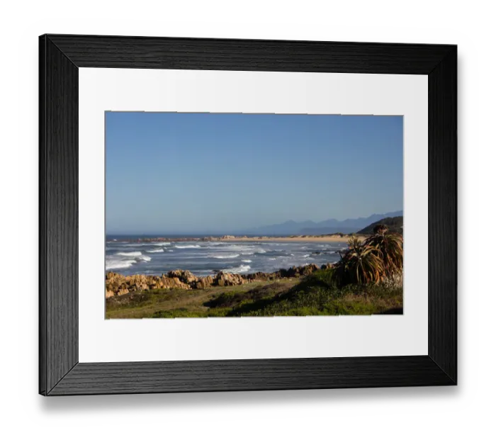 Framed Print : Foamy waves roll over rugged rocks and onto the sandy beach at Buffalo Bay (aka Buffelsbaai)