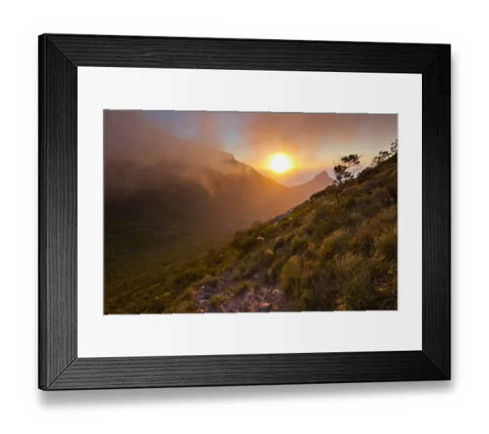 Framed Print : Scenic sunset over Table Mountain and Lions Head as seen from a hiking trail up Devils Peak, Cape Town, Western Cape Province, South Africa Framed Print : Scenic sunset over Table Mountain and Lions Head as seen from a hiking trail up Devils Peak, Cape Town, Western Cape Province, South Africa