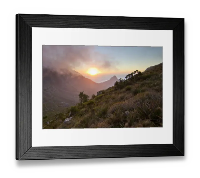 Framed Print : Scenic sunset over Table Mountain and Lions Head as seen from a hiking trail up Devils Peak, Cape Town, Western Cape Province, South Africa Framed Print : Scenic sunset over Table Mountain and Lions Head as seen from a hiking trail up Devils Peak, Cape Town, Western Cape Province, South Africa