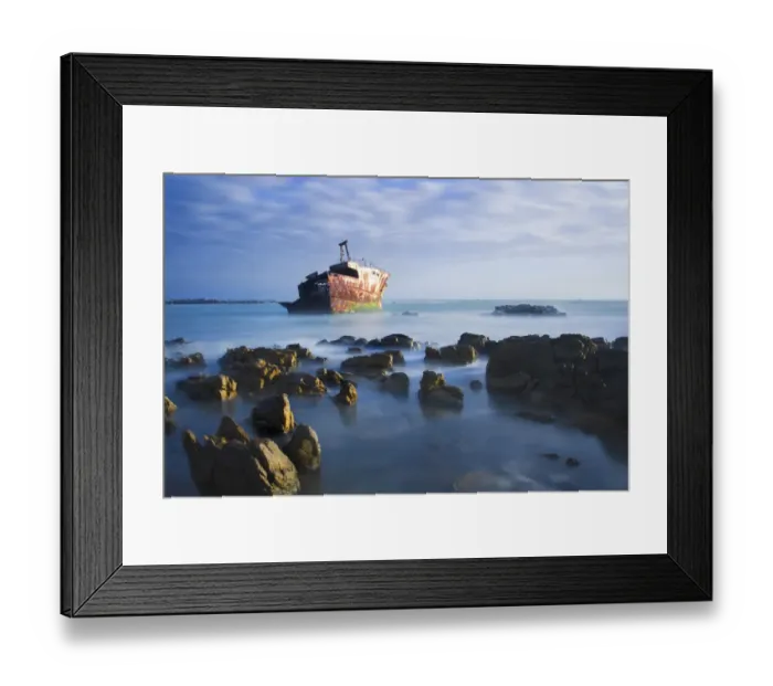 Framed Print : Old shipwreck long exposure on the rocks at sunset - Cape L Agulus South Africa Framed Print : Old shipwreck long exposure on the rocks at sunset - Cape L Agulus South Africa
