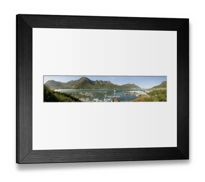 Framed Print : A panoramic picture of Hout Bay with Hout Bay Beach on the left and the marina and fishing harbour in the foreground. Chapmans Peak is in the background. Western Cape Province, South Africa Framed Print : A panoramic picture of Hout Bay with Hout Bay Beach on the left and the marina and fishing harbour in the foreground. Chapmans Peak is in the background. Western Cape Province, South Africa