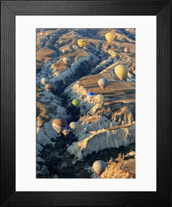Framed Print : Hot air balloons flying above rock formations in Red Valley, Goreme National Park, Goreme, Cappadocia, Anatolia, Turkey Framed Print : Hot air balloons flying above rock formations in Red Valley, Goreme National Park, Goreme, Cappadocia, Anatolia, Turkey