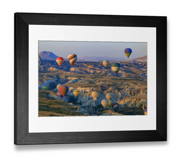 Framed Print : Hot air balloons flying above rock formations in Red Valley, Goreme National Park, Goreme, Cappadocia, Anatolia, Turkey Framed Print : Hot air balloons flying above rock formations in Red Valley, Goreme National Park, Goreme, Cappadocia, Anatolia, Turkey