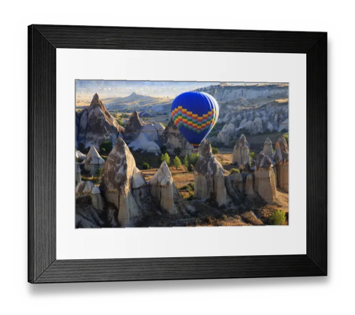 Framed Print : Hot air balloons flying above rock formations in Red Valley, Goreme National Park, Goreme, Cappadocia, Anatolia, Turkey Framed Print : Hot air balloons flying above rock formations in Red Valley, Goreme National Park, Goreme, Cappadocia, Anatolia, Turkey