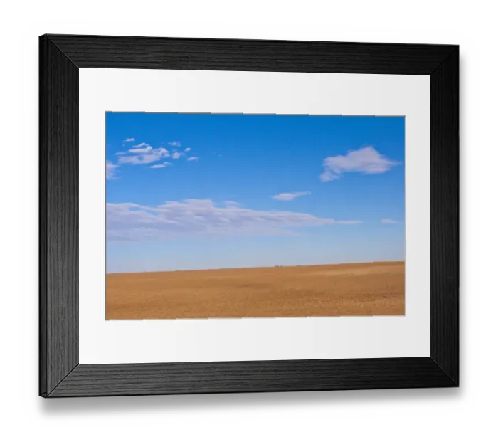 Framed Print : Prairie landscape under blue sky with white clouds, Omaha, Nebraska, USA Framed Print : Prairie landscape under blue sky with white clouds, Omaha, Nebraska, USA