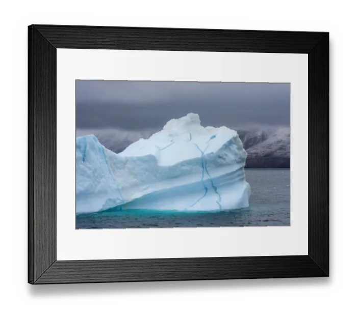 Framed Print : Iceberg shows veins of frozen meltwater, King Oscar Fjord, Greenland National Park, Denmark Framed Print : Iceberg shows veins of frozen meltwater, King Oscar Fjord, Greenland National Park, Denmark