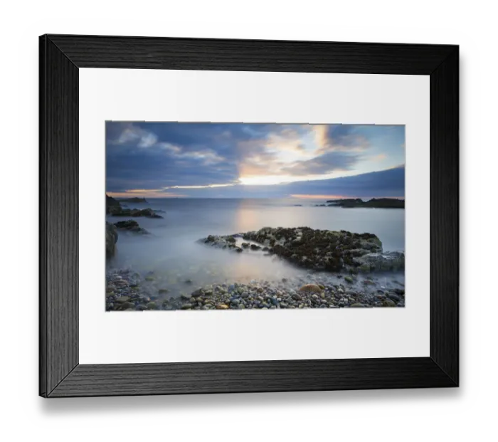 Framed Print : Early morning landscape of ocean over rocky shore with glowing sunrise - Findochty, Scotland Framed Print : Early morning landscape of ocean over rocky shore with glowing sunrise - Findochty, Scotland