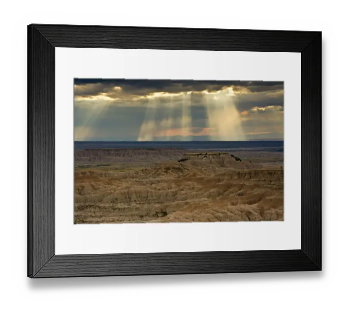 Framed Print : Approaching storm and sunbeams, Badlands National Park, South Dakota, USA