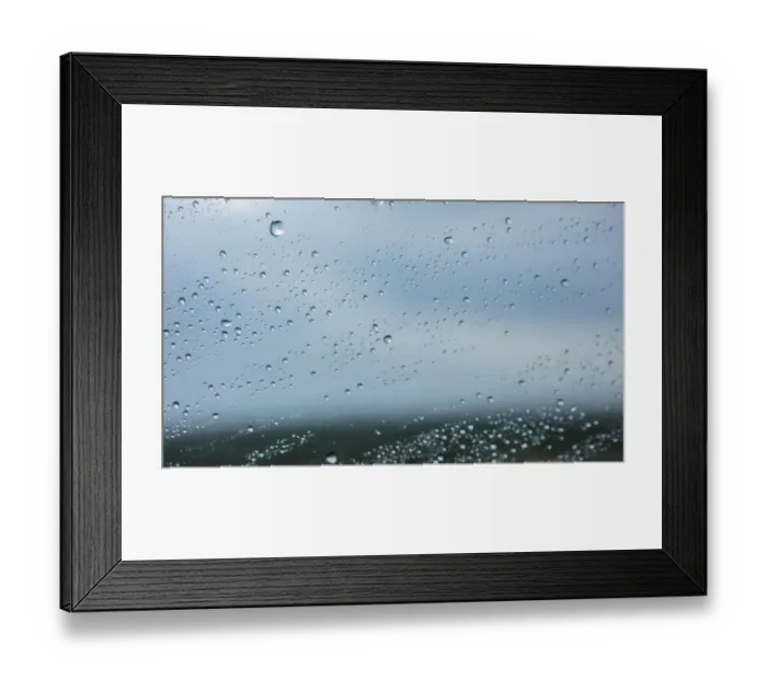 Framed Print : Close up of rain on window with storm clouds in the background, Cape Town, Western Cape, South Africa Framed Print : Close up of rain on window with storm clouds in the background, Cape Town, Western Cape, South Africa