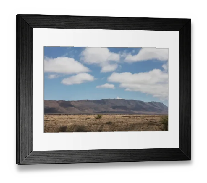 Framed Print : Wide angle shot of dry desert field with clouds, Western Cape Province, South Africa Framed Print : Wide angle shot of dry desert field with clouds, Western Cape Province, South Africa