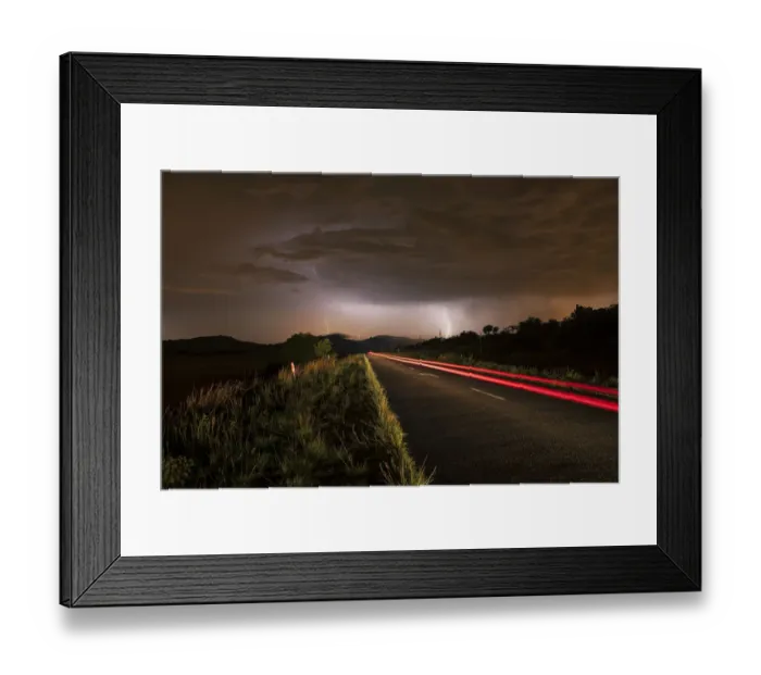 Framed Print : A thunderstorm at night with lightning on a remote road in the Cradle of Humankind, Magaliesburg, Gauteng Province, South Africa Framed Print : A thunderstorm at night with lightning on a remote road in the Cradle of Humankind, Magaliesburg, Gauteng Province, South Africa