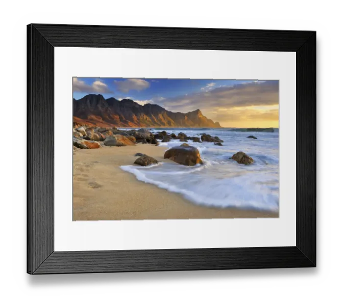 Framed Print : Dramatic Sunset over Kogel Bay in the Western Cape Province of South Africa with the Kogelberg Mountain Range forming a Stunning Backdrop Framed Print : Dramatic Sunset over Kogel Bay in the Western Cape Province of South Africa with the Kogelberg Mountain Range forming a Stunning Backdrop