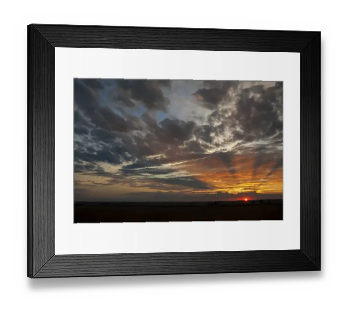 Framed Print : A Beautiful African sunset with sun rays over the agricultural farm lands of the North West Province in South Africa