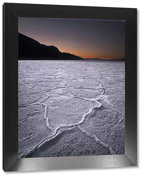 First light over salt pans at Badwater, Death Valley National Park, California, USA
