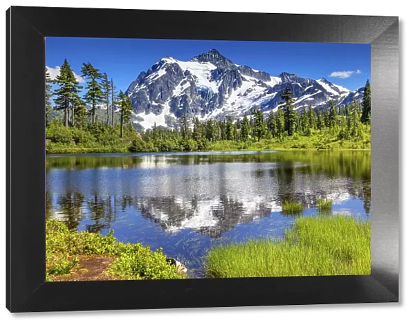 Mount Shuksan reflecting in lake, Washington State, USA