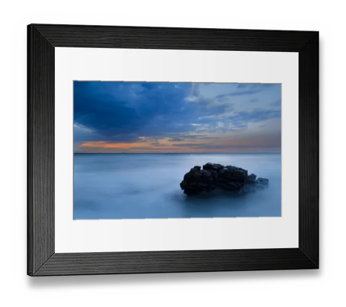 Framed Print : Sunrise landscape of ocean with waves clouds and rocks on beach Framed Print : Sunrise landscape of ocean with waves clouds and rocks on beach